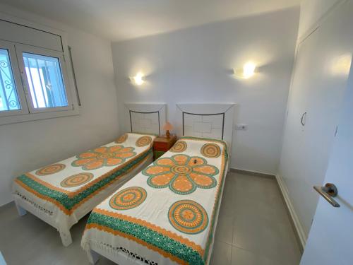 Postel nebo postele na pokoji v ubytování MIRAMAR 44