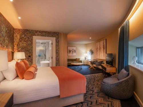 Postel nebo postele na pokoji v ubytování HYDE Hotel