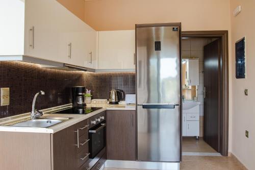 Dapur atau dapur kecil di Electi Apartments Charaki