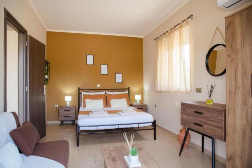 Ένα ή περισσότερα κρεβάτια σε δωμάτιο στο Electi Apartments Charaki