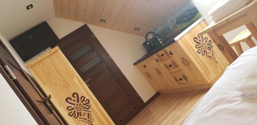 Ένα ή περισσότερα κρεβάτια σε δωμάτιο στο Apartamenty w cichej okolicy