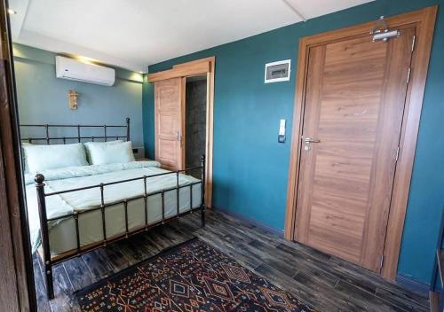 Ένα ή περισσότερα κρεβάτια σε δωμάτιο στο Liman Deluxe Hotel