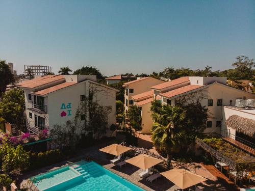an aerial view of a building and a swimming pool at San Trópico Boutique Hotel & Peaceful Escape in Puerto Vallarta