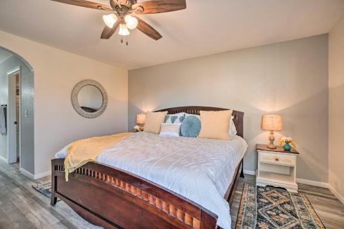 a bedroom with a bed and a ceiling fan at Family-Friendly Condo about 3 Mi to Branson Landing in Branson