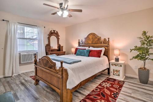a bedroom with a bed and a ceiling fan at Family-Friendly Condo about 3 Mi to Branson Landing in Branson