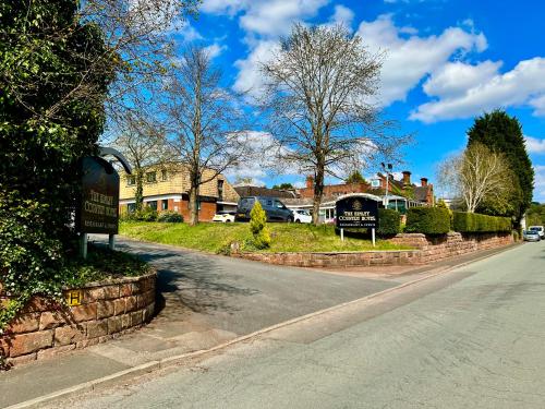 a street with a sign on the side of a road at Himley Country Hotel in Dudley