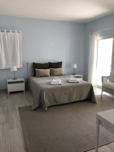Postel nebo postele na pokoji v ubytování Casa da Mondina Comporta