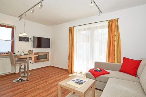 Foto Ferienwohnungen Berganemone 6