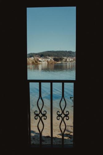 a view of the water from a balcony at GALIHOST - Maraxe 45 in Combarro