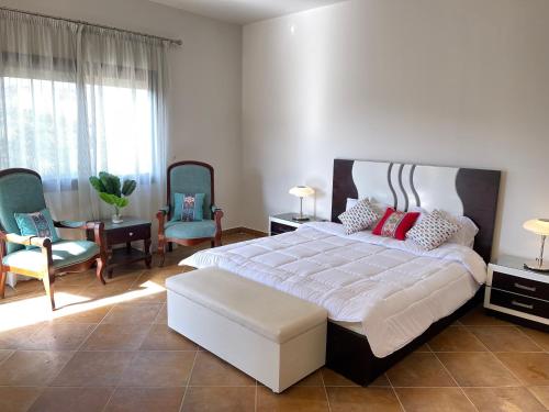 Marassi North Coast Standalone Villa 54 Vectoria tesisinde bir odada yatak veya yataklar