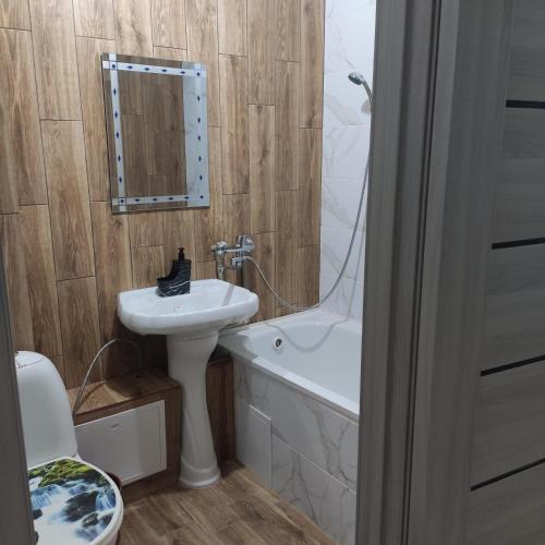 Ein Badezimmer in der Unterkunft ВИП квартира