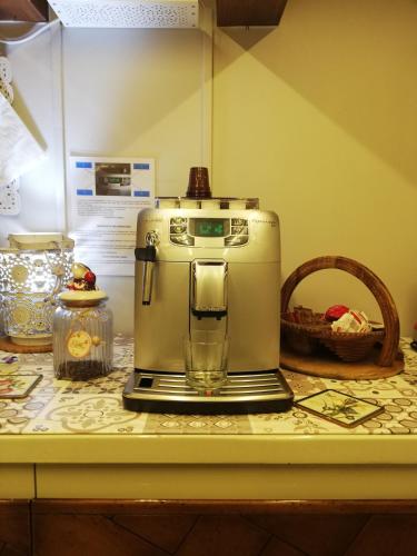 a coffee maker sitting on top of a counter at B & B San Domenico in Chioggia