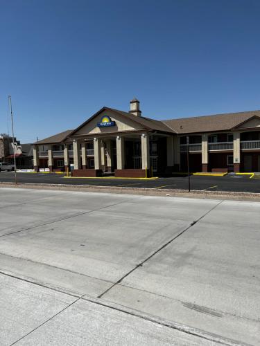 an empty street in front of a building at Days Inn by Wyndham Hays in Hays