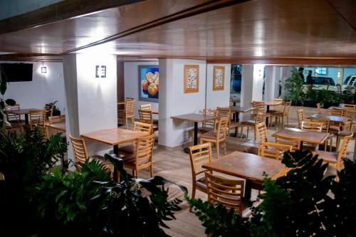 Restoran või mõni muu söögikoht majutusasutuses Hotel Qualitel Centro Histórico