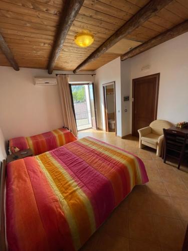 Posteľ alebo postele v izbe v ubytovaní B&B Antica Locanda San Ciriaco