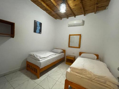 Auski Hostel Dahabにあるベッド
