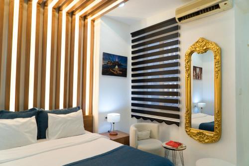 Posteľ alebo postele v izbe v ubytovaní The Havana Residence