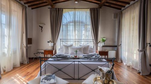 Ένα ή περισσότερα κρεβάτια σε δωμάτιο στο Cresta del Chianti