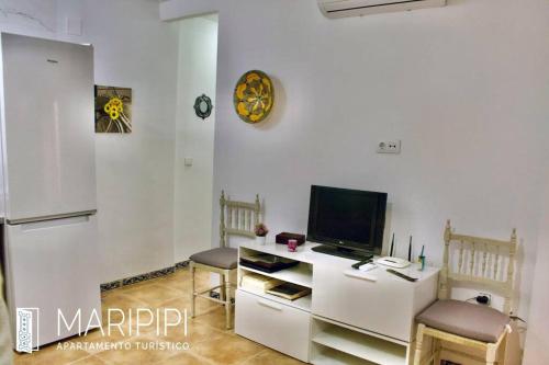 TV a/nebo společenská místnost v ubytování Apartamento maripipi