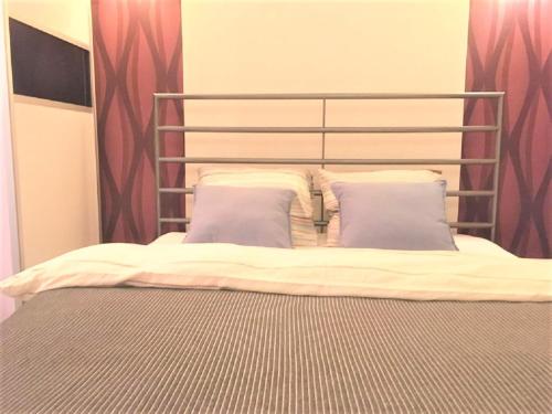 Postel nebo postele na pokoji v ubytování Secret Apartament 3 Poznań
