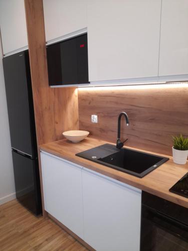 Dapur atau dapur kecil di Apartamenty Bartoszyce 2