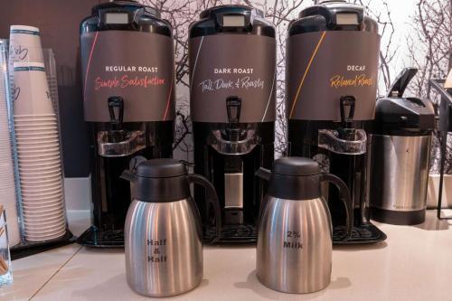 a group of coffee kettles sitting on a counter at Sonesta ES Suites Fort Lauderdale Plantation in Plantation