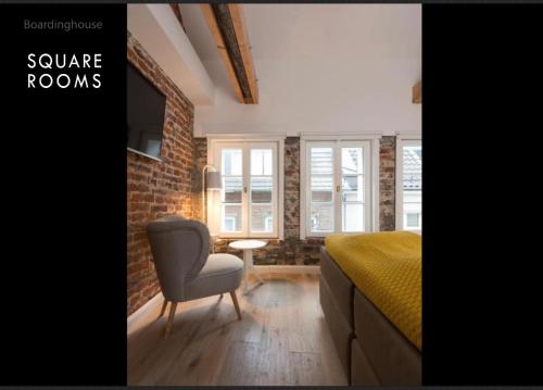 Et opholdsområde på Square Rooms 20