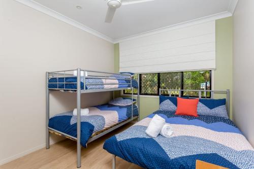 Ένα ή περισσότερα κρεβάτια σε δωμάτιο στο 8 Ibis Court Rainbow Shores