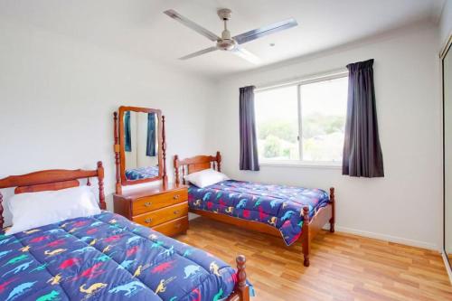 Ένα ή περισσότερα κρεβάτια σε δωμάτιο στο 29 Cypress Avenue Rainbow Beach