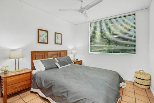 Ένα ή περισσότερα κρεβάτια σε δωμάτιο στο Yiningie Apartment Baden 9 Rainbow Shores
