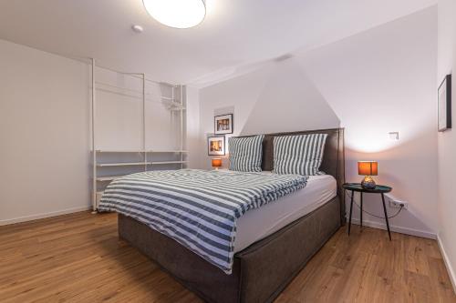 En eller flere senge i et værelse på B26 Apartments - Unterwegs zu Hause