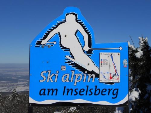 a sign at the top of a ski slope at Pension Christ in Waltershausen