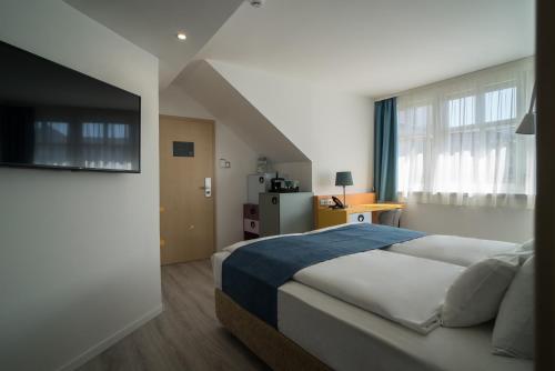 Posteľ alebo postele v izbe v ubytovaní Hotel Civitas