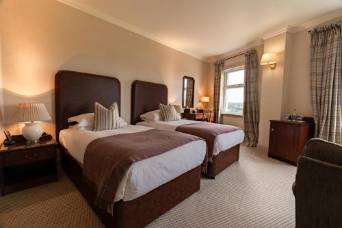 Кровать или кровати в номере Inver Lodge