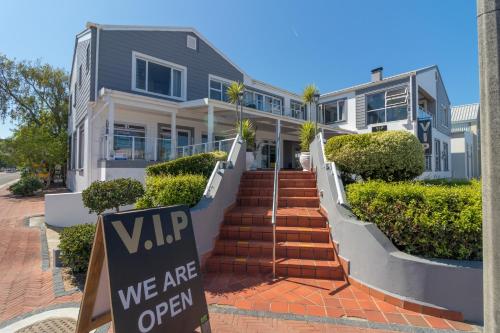 a house with a vip sign in front of it at Waterfront Delight in Knysna
