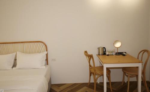 Postel nebo postele na pokoji v ubytování YOUDO inn