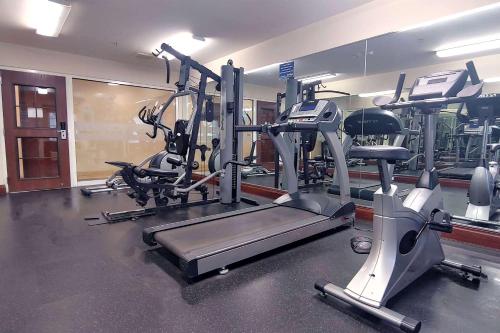 a gym with several treadmills and exercise bikes at Microtel Inn and Suites by Wyndham Ciudad Juarez, US Consulate in Ciudad Juárez