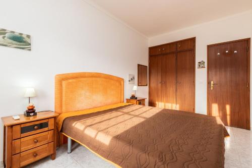 Säng eller sängar i ett rum på Lotamar Apartment by ALGARVEMANTA
