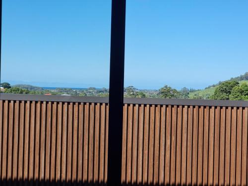 a view of a wooden fence from a window at RESIDENTIAL 4 BEDROOM House in Coffs Harbour