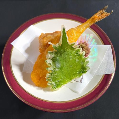 a plate of food on a table at Honjin in Izunokuni