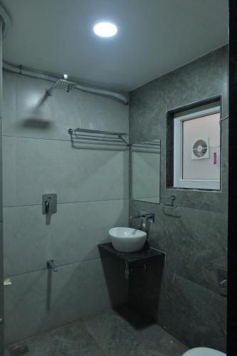 Kupatilo u objektu Hotel Sai Inn