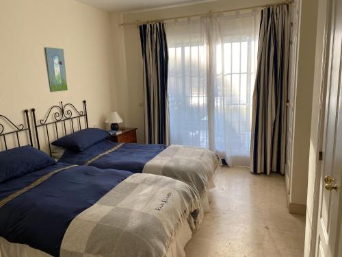Postelja oz. postelje v sobi nastanitve Lovely 2-Bed Apartment in Elviria Nr Marbella