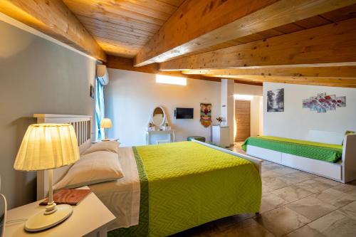 Postel nebo postele na pokoji v ubytování B&B La Canfora