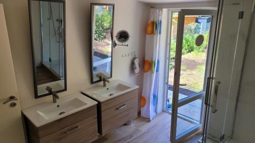 Ένα μπάνιο στο Bungalow Küstenherz-Timmendorf