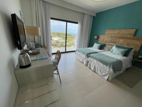Letto o letti in una camera di Hotel Playa Santandria Adults Only