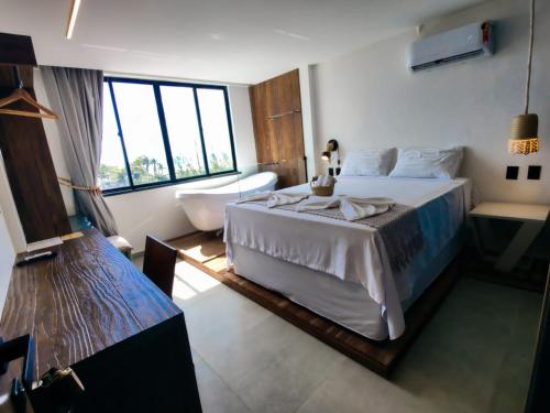 Ένα ή περισσότερα κρεβάτια σε δωμάτιο στο Maly Boutique Hotel