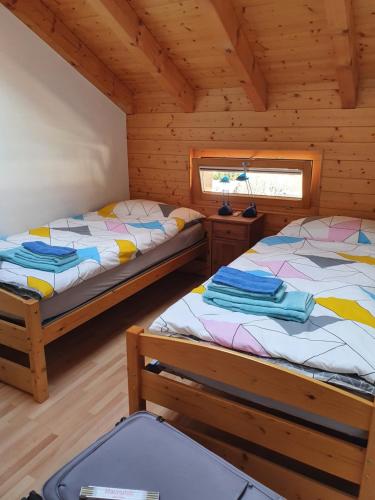 Postel nebo postele na pokoji v ubytování Appartement Orchis