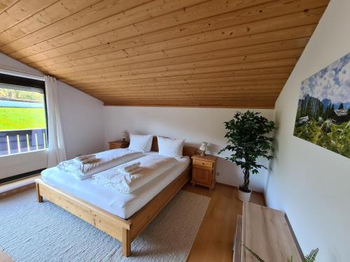 Ένα ή περισσότερα κρεβάτια σε δωμάτιο στο Schönes Ferienhaus am Herrenberg