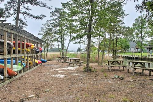 a group of picnic tables and benches in a field at Deck, Balcony Scenic Ocean View Beach Getaway! in Ocean View