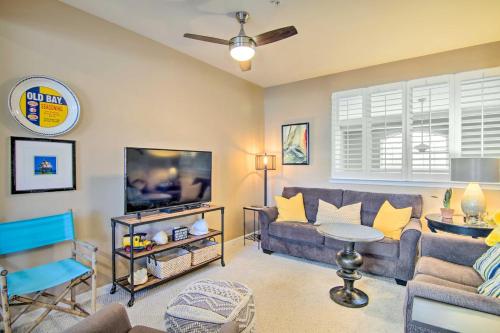 a living room with a couch and a tv at Deck, Balcony Scenic Ocean View Beach Getaway! in Ocean View